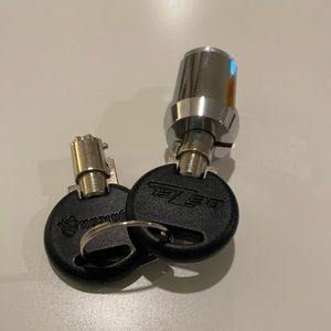 Cylinder storage unit lock